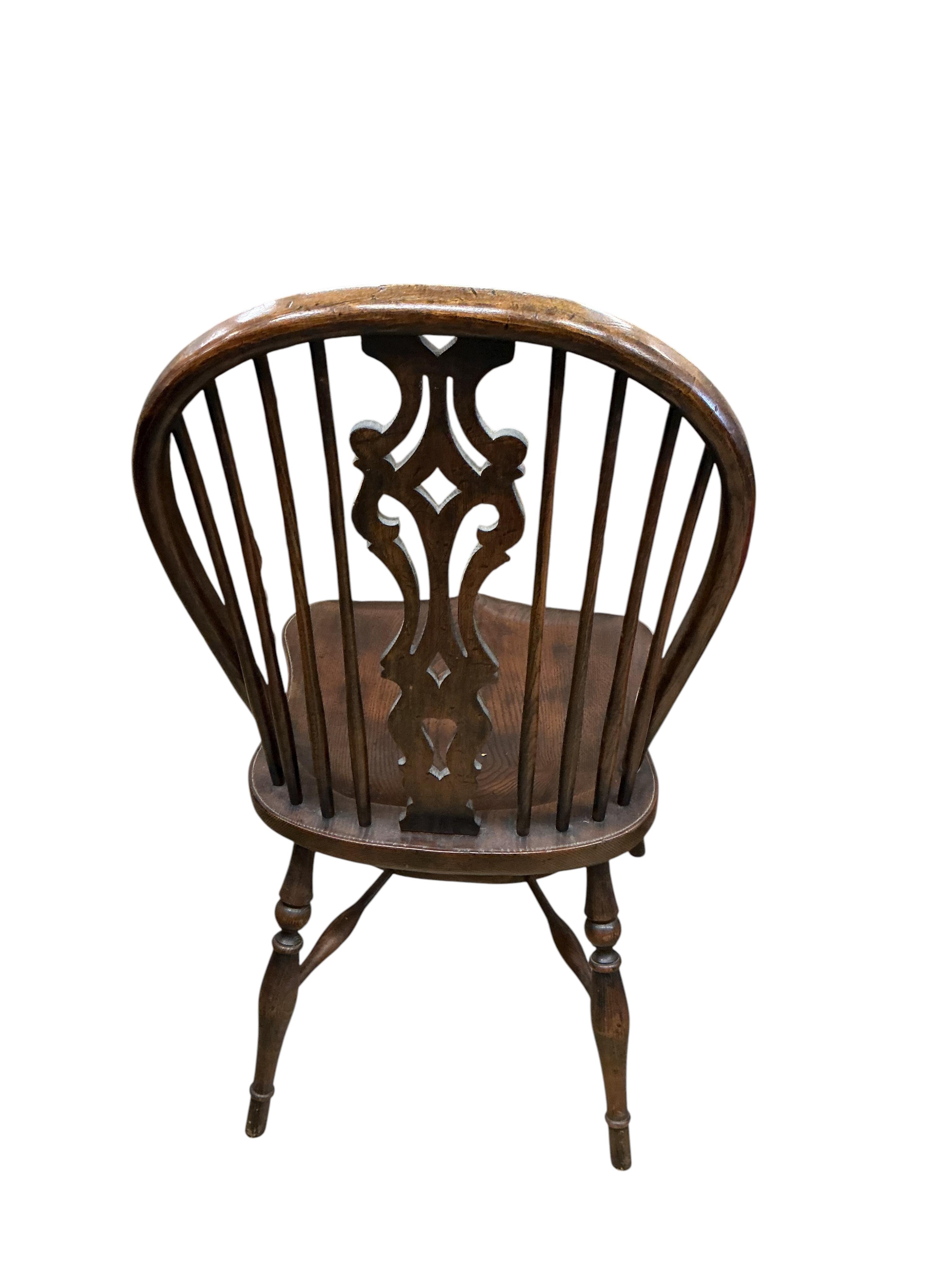 A set of six reproduction ash and elm Windsor dining chairs with crinoline stretchers, width 48cm, depth 46cm, height 99cm